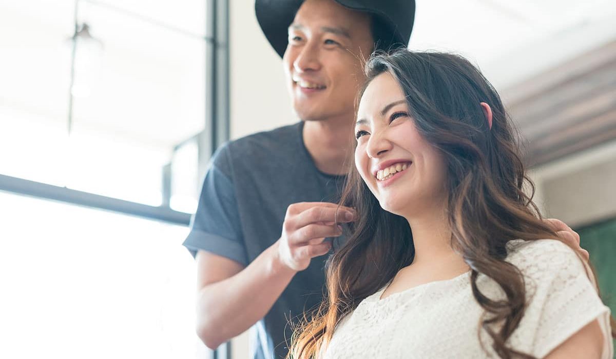 male hairdresser and female clientele; Shutterstock ID 2278012489; purchase_order: -; job: -; client: -; other: -